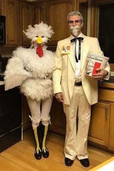 a man and woman dressed up in costumes