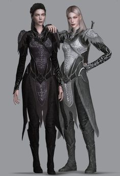 two women in armor standing next to each other on a gray background and one is wearing black