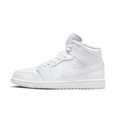 Inspired by the original AJ1, the Air Jordan 1 Mid offers fans a chance to follow in MJ's footsteps. Fresh color trims the clean, classic materials, imbuing modernity into a classic design.An Air-Sole unit provides lightweight cushioning.Real and synthetic leather in the upper offers durability and structure.A solid rubber outsole gives you traction on a variety of surfaces.Textile tongue feels soft and comfortable. Style # 554724-136 Color: Triple White Air Jordan 1 Retro Mid, Jordan 1 Retro Mid, Jordan 1 Mid White, Jordan Mid, Mid Top Shoes, Nike Internationalist, Jordan Model, Nike Air Jordan 1 Retro, Nike Air Jordan 1 Mid