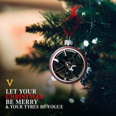 a christmas ornament hanging on a tree with the words, let your christmas be merry and you're very voque