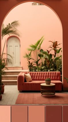 a living room filled with furniture and lots of plants in front of an arched doorway