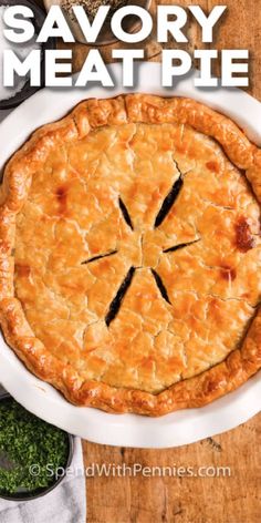 a pie with the words savory meat pie written on it in black and white