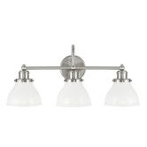 three light bathroom fixture with white glass shades on the bottom and an angled arm, chrome finish