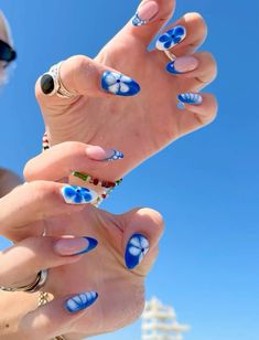 Multiple Nail Designs, Blue White Summer Nails, Blue Summery Nails, Blue Flowers Nails Design, Trendy Summer Nails Blue, Blue Nails With Hibiscus Flower, Crazy Blue Nails, Blue Nail Ideas For Summer, Flower Themed Nails