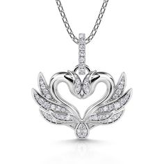 The pendant features two swans nestling tenderly together, creating an intimate scene. Their wings are decorated with sparkling gems, adding a touch of divine light between them. The swans' foreheads touch to form a heart shape, which reflects the close union of hearts. Give this symbol of devotion and let the embrace of the swan be an eternity in your journey together. Embrace the magic of love with this mesmerizing piece and witness the everlasting beautiful connection between you.Carat Weight Swan Accessories, Two Swans, Swan Jewelry, Swan Love, Divine Light, Classic Necklace, The Embrace, Swan Lake, Necklace Online