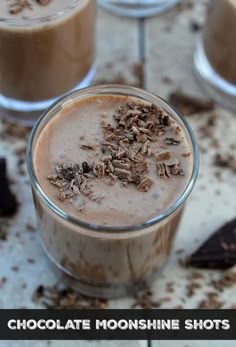 chocolate mousse shots are garnished with granola