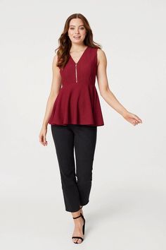 Add a figure flattering evening top to your closet with this zip front peplum blouse. With a v-neckline, a sleeveless fit, a bra-friendly wider strap, a cinched waist and a flared peplum hem sitting at the hip. Style with cropped black trousers and low block heels boots for girls night or pair with a fitted knit skirt and heels for a special event. Block Heels Boots, Sleeveless Peplum Top, Hip Style, Petite Coat, Evening Tops, Block Heel Boots, Stunning Outfits, Peplum Blouse, Heels Boots