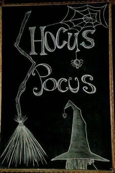 a chalkboard sign with the words hocps pocus written on it