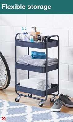 a cart with towels and shoes on it