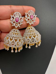 AD Jhumki Color Stone EaringsColor : Diamond Finish JhumkasSize : Approx 2.25 Inches; Weight : Approx 17 Grams EachStones : CZ --Color-- Stone Round American Diamond Jhumkas With Latkans, American Diamond Jhumkas With Latkans, Jhumka Collection, Antique Necklace Victorian, Real Pearl Necklace, Jhumki Earrings, Ethnic Necklaces, Traditional Earrings, Kundan Necklaces