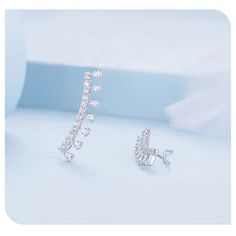 Let your style keep rolling on like the waves in these Beautiful White CZ Earrings! Handcrafted with sterling silver and premium AAAAA CZ gemstones, you'll be looking forward to showing these off with every outfit. The hypoallergenic and nickel-free 18K gold plating ensures that you never have to sacrifice your comfort for style. Now that's what we call a win-win! Sold as a pair Hypoallergenic and always nickel free 18K gold plated on 925 Sterling Silver Beautifully handcrafted & high-finish tex Elegant Silver Cubic Zirconia Ear Cuff, Elegant Silver Crystal Ear Cuff, Elegant Silver Cubic Zirconia Ear Climbers, Silver Cubic Zirconia Ear Cuff As Gift, Silver Cubic Zirconia Ear Climbers, Silver Ear Climbers With Prong Setting As Gift, Silver Cubic Zirconia Ear Climbers For Anniversary, Silver Cubic Zirconia Cartilage Earrings, Trendy Cubic Zirconia Earrings With Sparkling Stones