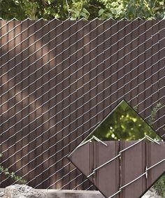 an image of a fence with a reflection in it