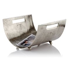 a magazine holder made out of metal with a photo inside the front and bottom section