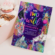 a birthday card with an image of two wild animals and zebras in the background