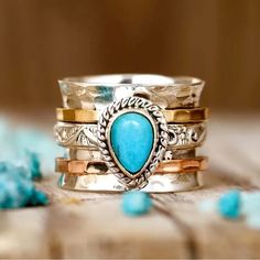 This Ring Is Made Extremely Well. It’s New With Tags And Has Some Weight To It. Very Pretty Love The Blue Stone In The Middle. Unique Stackable Turquoise Ring, Unique Blue Stackable Jewelry, Bohemian Blue Stackable Rings, Bohemian Stackable Blue Turquoise Ring, Blue Bohemian Jewelry With Metal Ring, Bohemian Blue Jewelry With Metal Ring, Bohemian Blue Stackable Turquoise Ring, Turquoise Metal Rings As A Gift, Turquoise Metal Rings For Gift