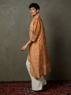 Editor's Note Introducing our camel brown kantha-hand embroidered bhairavi jacket, a unique blend of tradition and style. This jacket features intricate kantha hand embroidery that adds an artisanal touch to your outfit. The rich camel brown color exudes warmth and sophistication, making it a versatile choice for any occasion. Note: Inner top and pants worn by model is for styling purposes only Color: Brown Fabric: Murshidabad silk Components: Jacket Occasion: Daywear Note: Product colour may sl Luxury Traditional Brown Outerwear, Traditional Brown Embroidered Fabric With Resham Embroidery, Brown Embroidered Dupatta Shawl, Luxury Embroidered Brown Outerwear, Traditional Brown Resham Embroidered Fabric, Ritu Kumar, Ancient Designs, Brown Fabric, Brown Jacket