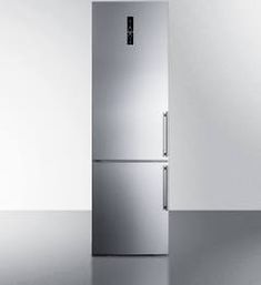 a silver refrigerator freezer sitting in the middle of a kitchen floor next to a white wall