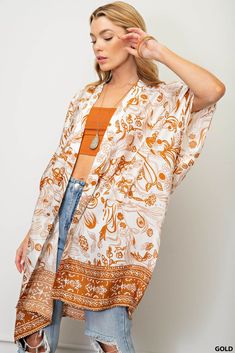 Experience beautiful, effortless style in this gorgeous Gold Floral Kimono! Feel luxurious and confident in the graceful side slits and eye-catching border print. Enhance any look with this stunning staple and make a lasting impression! Don't miss out - get yours today! Long Printed Kimono For Day Out, Floral Print Tunic Kimono, Long Kimono With Paisley Print For Summer, Summer Kimono With Abstract Print, Long Summer Kimono With Paisley Print, Kimono Outfits, Modern Kimono, Casual Kimono, Traditional Kimono