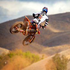 a person on a dirt bike in the air