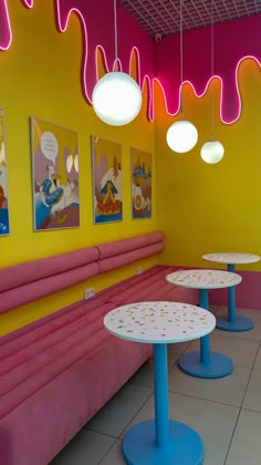 tables and benches in a brightly colored restaurant