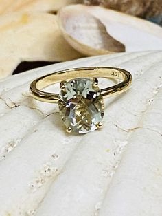 Elegant Oval Solitaire Gemstone, Elegant Green Oval Amethyst Ring, Classic Oval Gemstone With Center Stone, Classic Green Amethyst Ring As Gift, Classic Green Amethyst Ring Gift, Classic Green Amethyst Ring For Gift, Oval Green Amethyst Jewelry, Green Oval Amethyst Ring For Anniversary, Green Amethyst Oval Ring For Anniversary