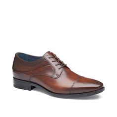 Johnston & Murphy-Gibbons Cap Toe Oxford Add to your formalwear wardrobe with the Gibbons cap toe oxford from Johnston & Murphy. This leather pair sports a sleek silhouette made to match with favorite professional or formal ensembles. Fitted Derby Shoes For Semi-formal Occasions, Fitted Derby Shoes For Semi-formal Events, Fitted Cap Toe Derby For Semi-formal Occasions, Fitted Leather Cap Toe Oxfords, Vintage Semi-formal Cap Toe Oxfords, Fitted Brown Cap Toe Oxfords, Classic Cap Toe Slip-on Oxfords, Brown Leather Cap Toe Oxfords, Johnston Murphy