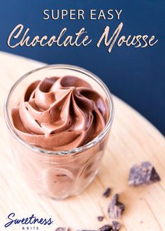 there is a chocolate mousse in a small glass on the table with text overlay