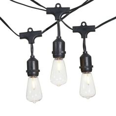 three light bulbs hanging from the ceiling with black wire and clear glass bulb lights on each end