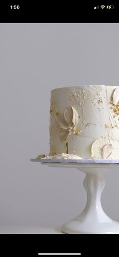 a white cake sitting on top of a table