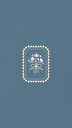 a blue and white square with flowers in the center on a light blue background that is framed by scalloped edges