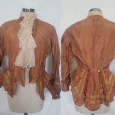 Antique 19th century, victorian, handmade  jacket with front  lace plastron and double breasted brass buttons. Light brown silk with cinched waist, layered assymetrical edges and scallop trim. Long sleeves with pleated cuffs. It fits a size S, even if I think it is not in a wearing condition, but to use as a display, or study piece. Please check measurements: Shoulders 40cm/15.7" Bust 82cm/32.3 Waist 62cm/24.3" Heigth back 65cm/25.5"               Front 58cm/22.7" Sleeve 58cm/22.7" The jacket, a Victorian Long Sleeve Dress With Buttons, Vintage Victorian Dress With Buttons For Daywear, Historical Victorian Dress With Buttons, Victorian Long Sleeve Dress With Buttons For Fall, Victorian Dress With Buttons For Costume, Historical Victorian Long Sleeve Dress For Fall, Historical Victorian Dress With Long Sleeves For Fall, Victorian Dress With Ruffles For Fall, Victorian Dress With Historical Design For Fall