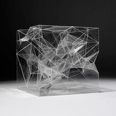 an abstract sculpture made out of clear plastic