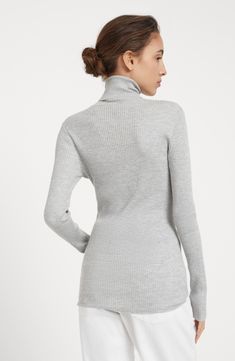 Cashmere and silk fibers are manufactured together with a fine lamÃ© thread to enrich the texture with delicate metallic reflections. The presence of a synthetic fiber provides added comfort. High collar Regular shoulder Regular sleeve Rib knit Elegant Gray Cashmere Sweater, Elegant Gray Turtleneck Sweater, Elegant Stretch Gray Sweater, Elegant Gray Knit Sweater, Elegant Fitted Sweater With Funnel Neck, Elegant Cashmere Knit Sweater, Fitted Gray Merino Wool Sweater, Sparkle Sweater, Latest Sweater