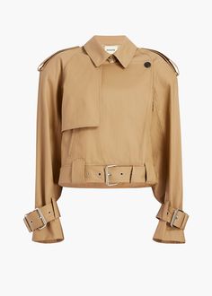 A cropped trench transformed by moto accents and an oversized fit. Belted hem and cuffs with chrome buckles. Classic trench details. Cropped Trench Coat, Trench Jacket, Belted Jacket, Motorcycle Style, Leather Trench Coat, Fall Jackets, Jacket Design, Moto Jacket, Outerwear Women