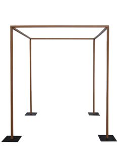 an open metal structure with two black square bases on each side and one rectangular base at the top