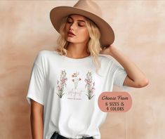 Celebrate the beauty of August with our custom birth month flowers t-shirt. Each tee showcases the vibrant and enchanting flowers associated with August, gladiolus and poppy flowers. Made with premium materials, this shirt combines comfort and style. Embrace your birth month with this unique floral design, perfect for August birthdays or as a meaningful gift. Stand out in a crowd and let your shirt tell your story. Showcasing the essence of August's birth month flowers, this t-shirt is a symbol of individuality and natural beauty. Wear it with pride and immerse yourself in the floral symphony of August. Upgrade your wardrobe with our custom birth month flowers t-shirt and let the world know that August is your month to bloom. This product is made especially for you as soon as you place an Summer Birth Flower Short Sleeve T-shirt, Birth Flower Short Sleeve T-shirt For Summer, Spring Birth Flower Short Sleeve T-shirt, Spring Gift White T-shirt, August Gladiolus, August Birthdays, Unique Floral Design, August Birthday, Poppy Flowers