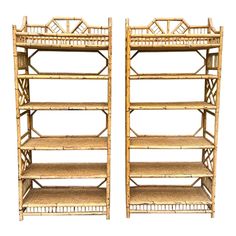 a pair of bamboo shelves with baskets on each shelf