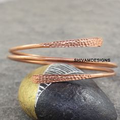 Copper Healing Bracelet , Copper Cuff Bangle , Copper Bangle Bracelet, Wrap Bangle , Adjustable Copper Bangle, Anniversary Copper Jewelry Metal - Pure Copper Style : Bangle Our Goal is 100% Customer Satisfaction :- -: All Products Description are 100% Exact:- XS (adult) - 14cm to 15.4cm ( 7 inch ) S (adult) - 15.5cm to 16.5cm (7.5 inch) M (adult) - 16.6cm to 17.5cm (8 inch) L (adult) - 17.6cm to 18.5cm (8.5 inch) XL (adult) - 18.6cm to 20cm (9 inch) XXL (9.5 inch) Benefits of Copper Bangle !! We Handmade Adjustable Minimalist Cuff Bracelet, Handmade Minimalist Adjustable Cuff Bracelet, Minimalist Handmade Adjustable Cuff Bracelet, Unique Adjustable Wrap Bangle Bracelet, Adjustable Double Band Cuff Bracelet As Gift, Adjustable Unique Rose Gold Bracelets, Adjustable Wrap Bangle Bracelet, Adjustable Unique Wrap Bangle Bracelet, Unique Adjustable Rose Gold Bracelet