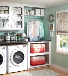 a washer and dryer in a small room