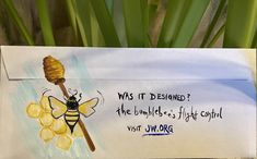 a bee with a honey comb on it's back is next to a note that says, was it designed?