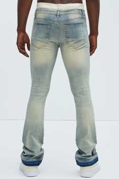 Available In Light Wash. Flared Fit Stretch Denim 85% Cotton 13% Polyester 2% Spandex Disclaimer: Due To The Specialized Distressing & Wash Process, Each Garment Is Unique. Zip Fly Button Closure 5 Pocket Detail Distressed Detail Ripped Patch Knee Detail Imported | Mens Below Me Distressed Skinny Flare Jeans in Light Wash size 38 by Fashion Nova Ripped Fitted Flare Cotton Jeans, Fitted Ripped Cotton Flare Jeans, Fitted Cotton Ripped Flare Jeans, Fitted Distressed Light Wash Flare Jeans, Ripped Fitted Flare Jeans For Summer, Summer Ripped Fitted Flare Jeans, Fitted Distressed Jeans For Spring, Spring Distressed Fitted Jeans, Fitted Distressed Washed Blue Bottoms