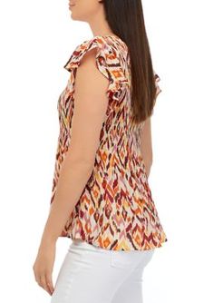 Feminine flutter sleeves add charming appeal to this pleater top from Spense. | Spense Women's Flutter Sleeve Pleater Top, X-Large Pleated Stretch Top For Summer, Summer Stretch Pleated Top, Casual Pleated V-neck Tops, Flutter Sleeve Tops With Ruffle Hem For Vacation, Vacation Flutter Sleeve Top With Ruffle Hem, Feminine Top With Smocked Back And Flutter Sleeves, Vacation Tops With Ruffle Hem And Flutter Sleeves, Casual Blouse With Flutter Sleeves And Smocked Back, Casual Blouse With Smocked Back And Flutter Sleeves