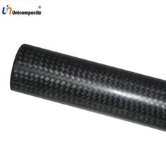 an image of a black carbon fiber tube on white background with the words unicomposte above it