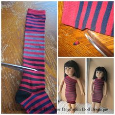 the doll is wearing a striped dress and holding a pair of scissors