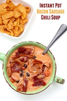 a bowl of soup with bacon, beans and tortilla chips on the side