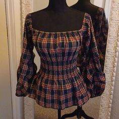 Nwt New With Tags Infinity Raine On Or Off The Should Top Blouse Smocked Middle Pleated Puffy Sleeves Navy, Red, Green, Yellow, White Plaid Perfect For The Holidays Size M Measurements 15" Underarm To Underarm Without Being Stretched, Has Room To Grow If Needed 19.5" From Top Of Chest To Hem Smoke Free Home Holiday Party Plaid Sexy Date Night Christmas Casual Multicolor Cotton Smocked Top, Casual Yellow Smock Top, Casual Plaid Smocked Top, Casual Plaid Smocked Top With Smocked Bodice, Cotton Stretch Smocked Top For Fall, Fitted Plaid Smocked Top With Smocked Back, Stretch Cotton Smocked Top For Fall, Trendy Multicolor Smocked Top, Trendy Cotton Smocked Top For Fall