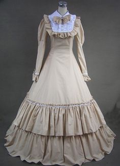 Beautiful Long Victorian Fashion Dress for Sale   Description: Beautiful Long Victorian Fashion Dress for Saleis full of mystery and lure, both Luxuriant and dark. About death, about horror, about mystery, about riddle, these are all the Gothic lolita try to express. Such a ruiness feeling.Beautiful Long Victorian Fashion Dress for Sale is colored in beige, long style with long sleeves dedicated to give you slim figure. Traditional design with kawaii bow ties, such a charming creation. Don amp;# Victorian Dresses For Sale, Gothic Victorian Dresses, Layers Long, Ruffle Long Dress, Victorian Fashion Dresses, Historical Costuming, Victorian Costume, Gothic Victorian, Victorian Clothing