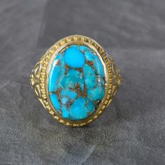 Gold Turquoise Oval Ring, 14k Gold Natural Genuine Turquoise Ring, Vintage Style Ring Stone Boho Ring, Christmas Gift Handmade Fine Jewelry  Handmade item We provide the Excellent quality Jewelry to our Customers. Customer satisfaction is our first priority. All sizes are available for any query contact us. PRODUCT  :-   Gemstone  Ring Material     :-    Brass, 925 sterling silver  Gemstone :-     Turquoise stone size  :-    Oval We have Brass rings in all size for both men and women. We always Gold Oval Turquoise Ring For Anniversary, Gold Oval Cabochon Turquoise Ring, Gold Turquoise Ring With Oval Cabochon, Bohemian Oval Turquoise Ring For Anniversary, Heirloom Blue Oval Cabochon Turquoise Ring, Gold Turquoise Oval Ring For Wedding, Gold Oval Turquoise Ring For Wedding, Oval Turquoise Ring In Yellow Gold For Anniversary, Gold Oval Turquoise Wedding Ring