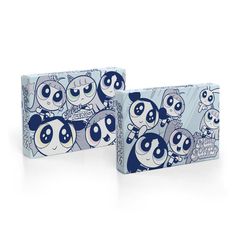 two boxes with cartoon characters on them, one is blue and the other is white