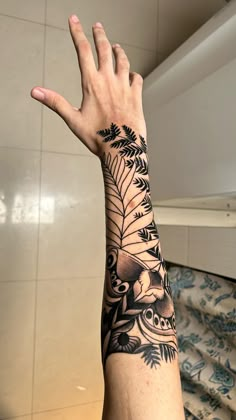 a person's arm with a tattoo on it